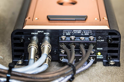 4 channel amplifier in its installed below the seat